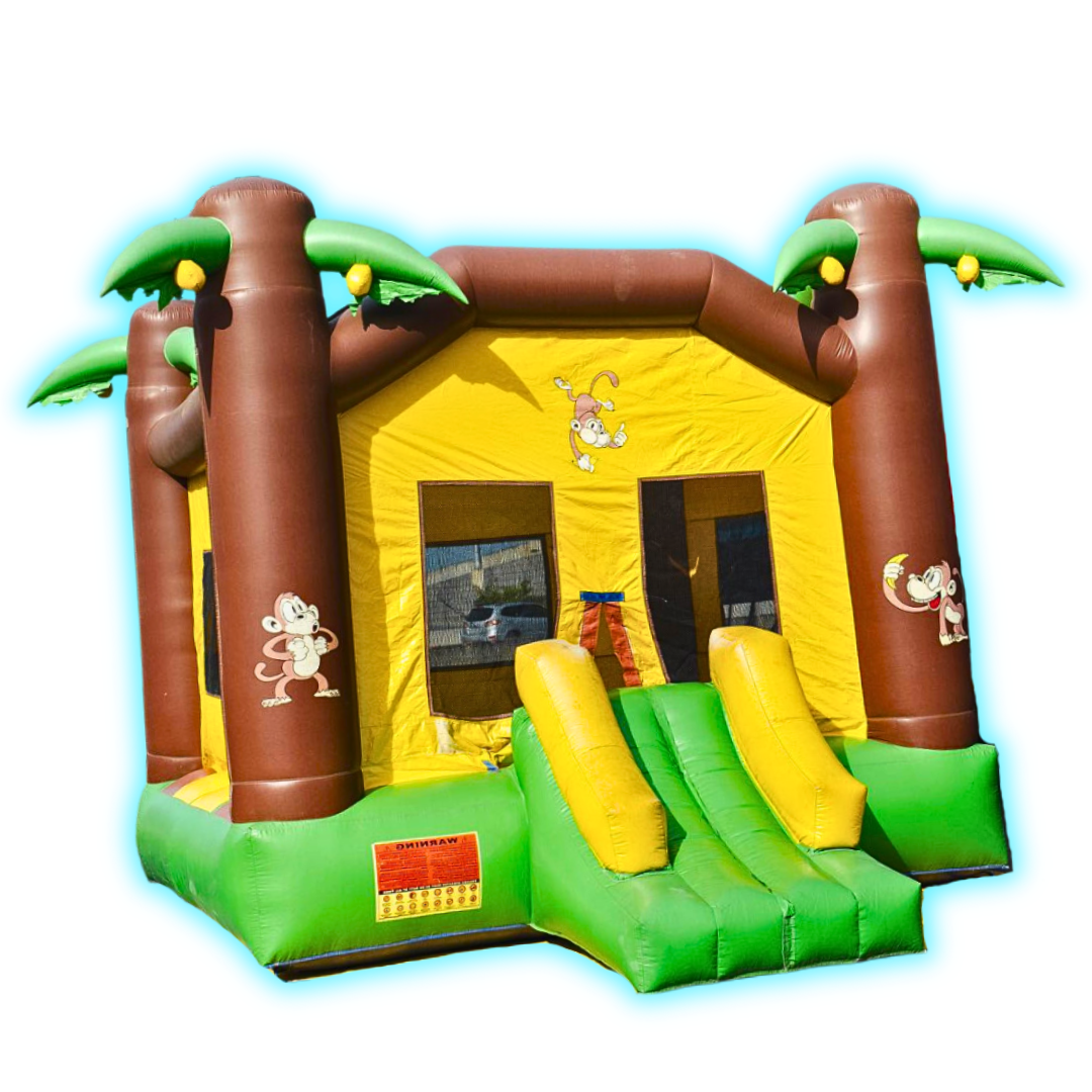 A bouncy house with monkeys and palm trees on it