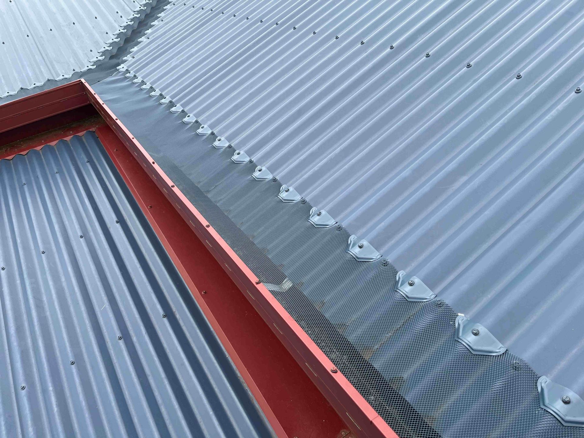 A Close Up of a Gutter on a Metal Roof  — All-Clear Gutter Guard NQ in Cairns, QLD