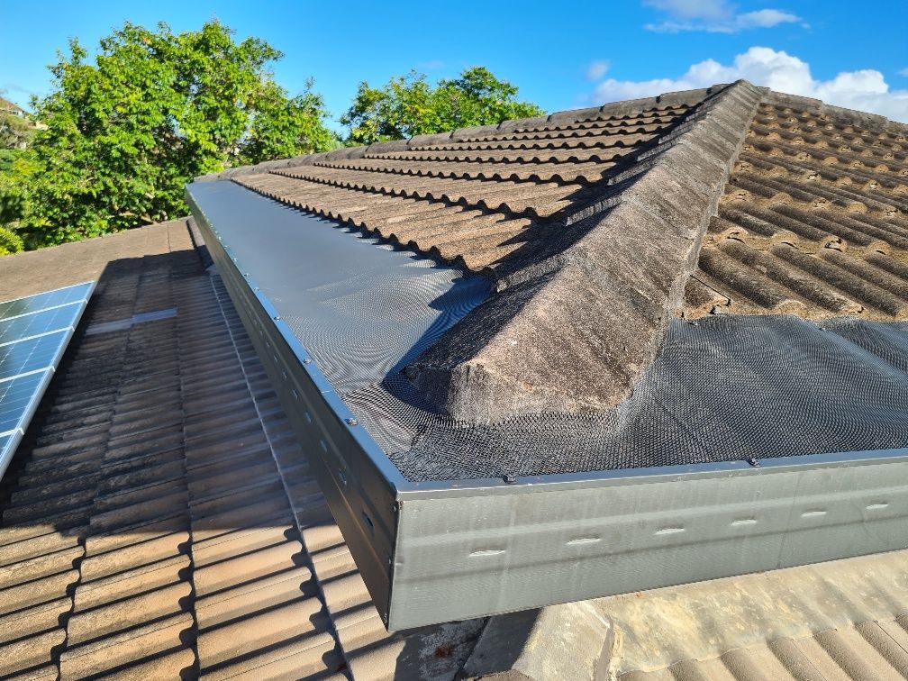 Close-Up of A Tiled Roof with Installed Gutter Guard — All-Clear Gutter Guard NQ in Yungaburra, QLD