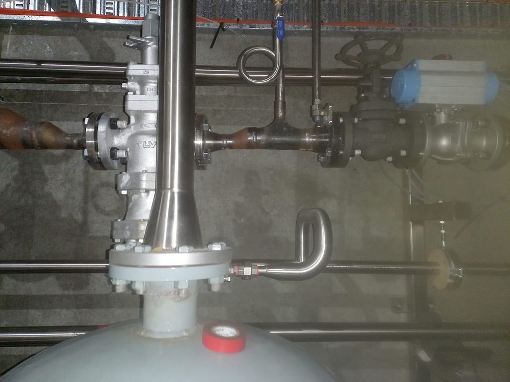 Stainless Steel Pipe With a Red Button — Vids Fabrication in South Lismore, NSW