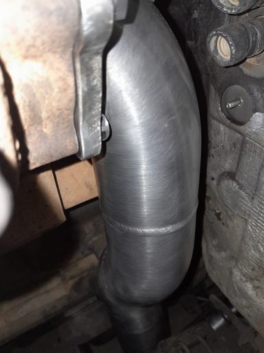 Close Up Of A Metal Pipe On A Car Engine — Vids Fabrication in South Lismore, NSW