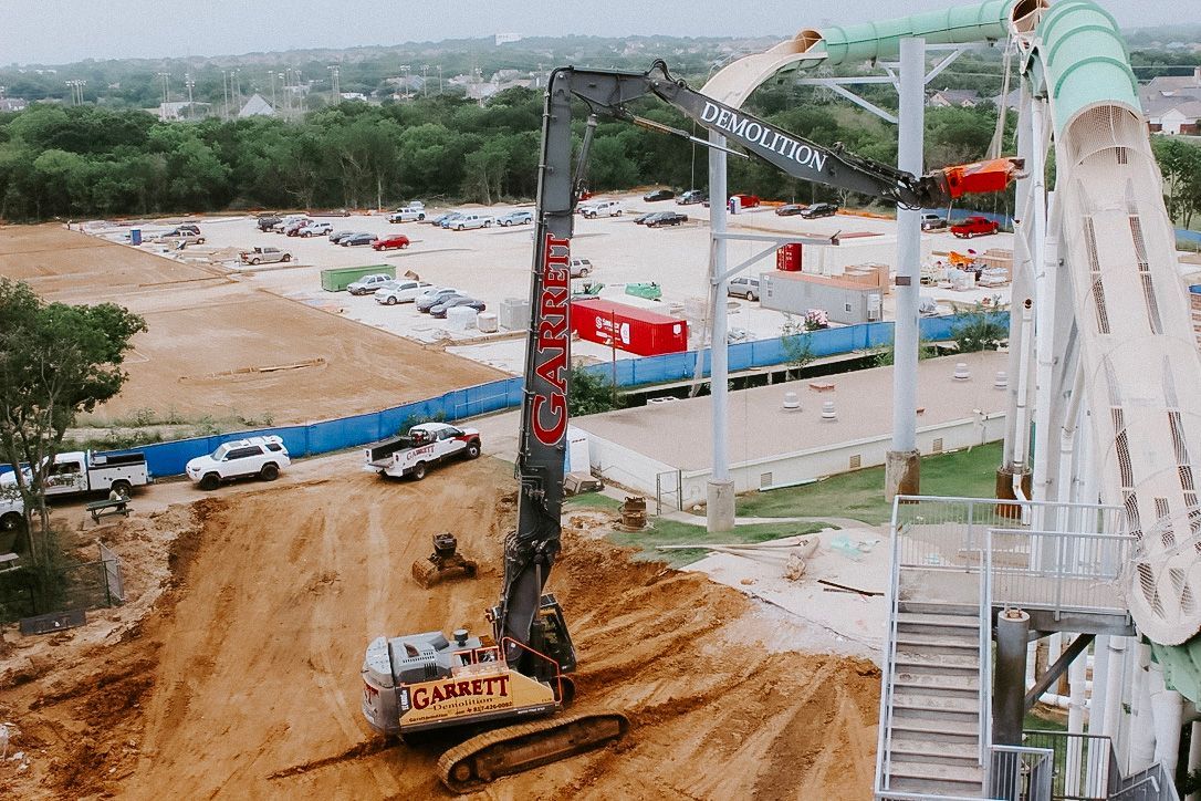 An aerial view of a water slide being built at a water park.