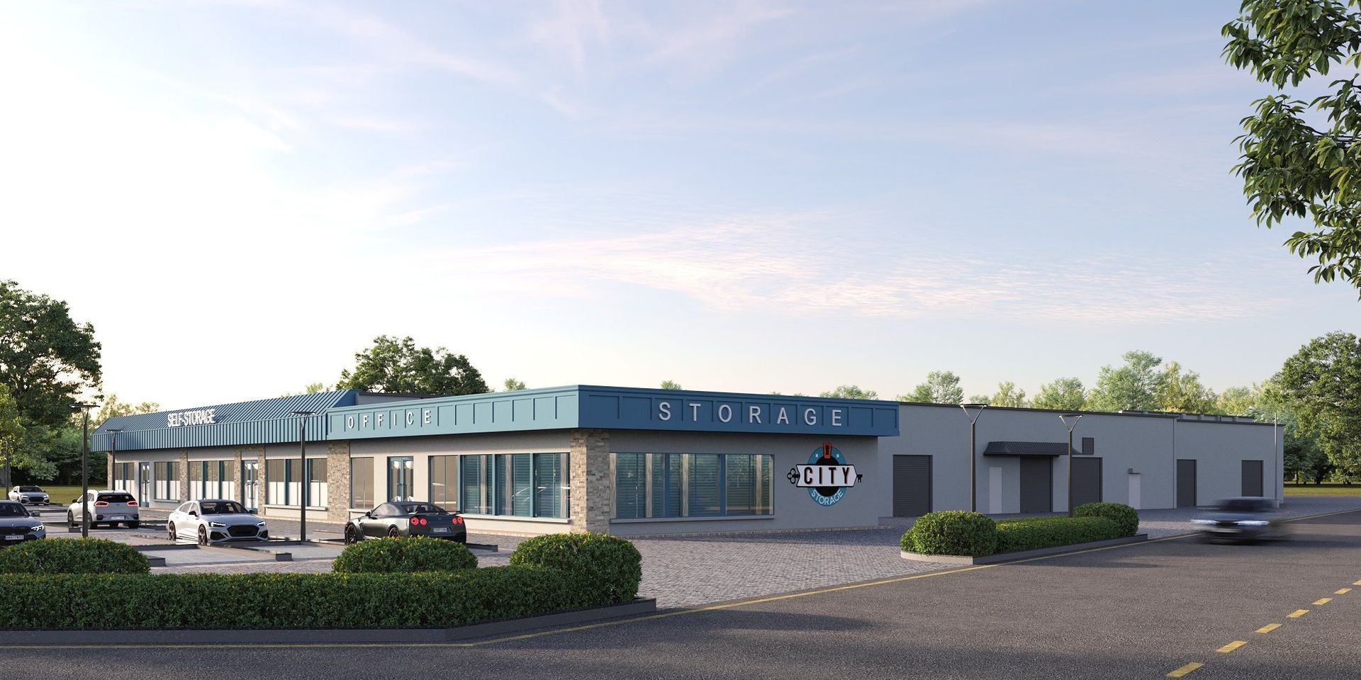 Modern self-storage facility with office and drive-up units at City Storage, featuring a clean exterior, parking spaces, and a clear sky backdrop