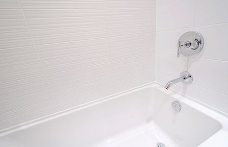 Plumbing Remodeling — White Bathtub in Griffin, GA