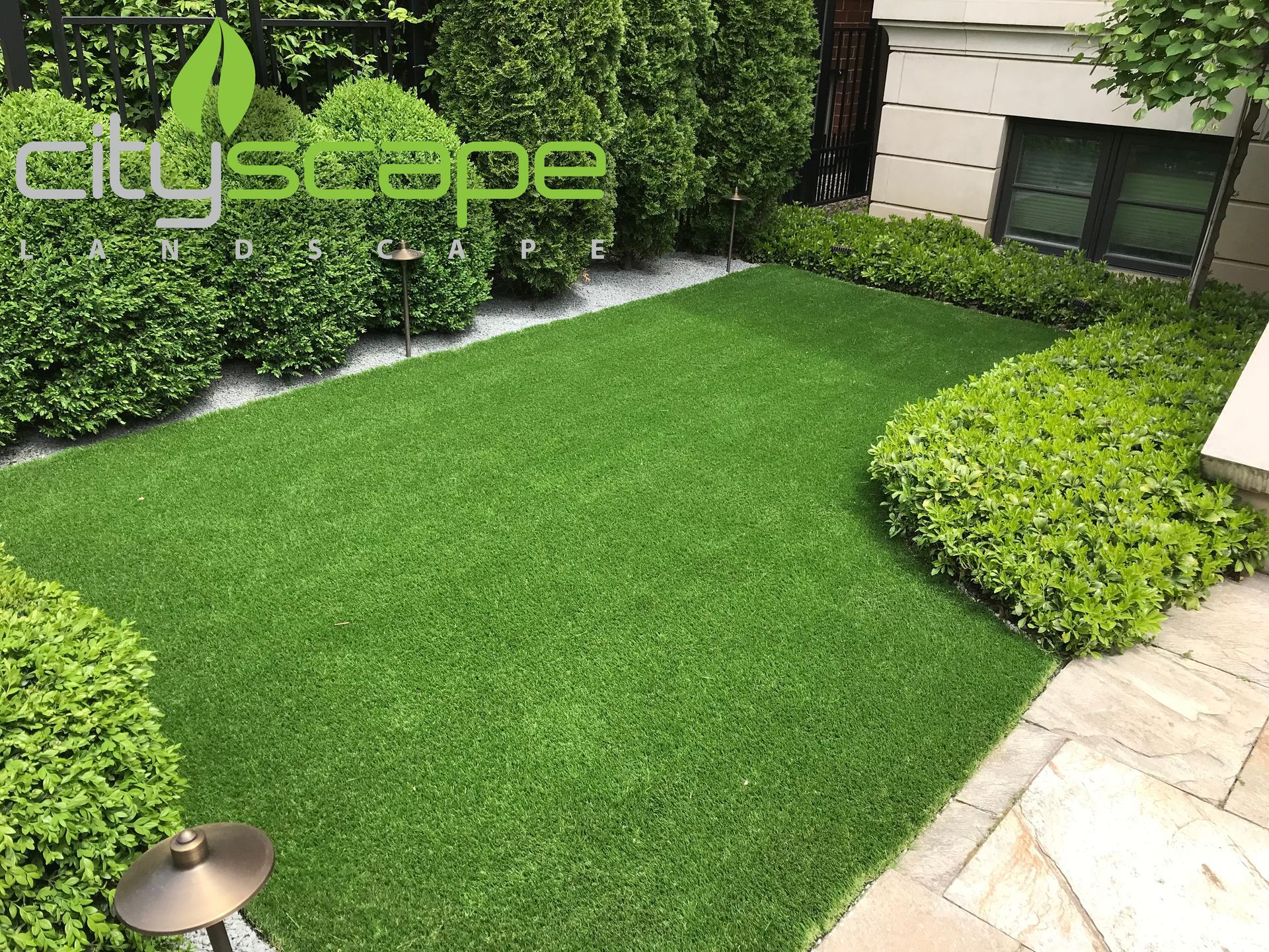 Lush green lawn installed by Cityscape Landscape in Chicago backyard