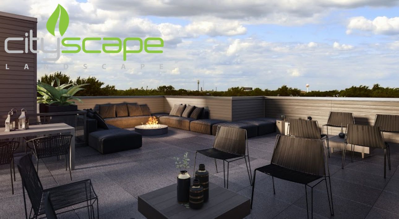 Rooftop lounge with modern furniture, fire pit, and Cityscape logo. Overcast sky with trees in the distance.