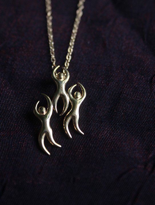 Dan Eldon Dancing Figures Pendant