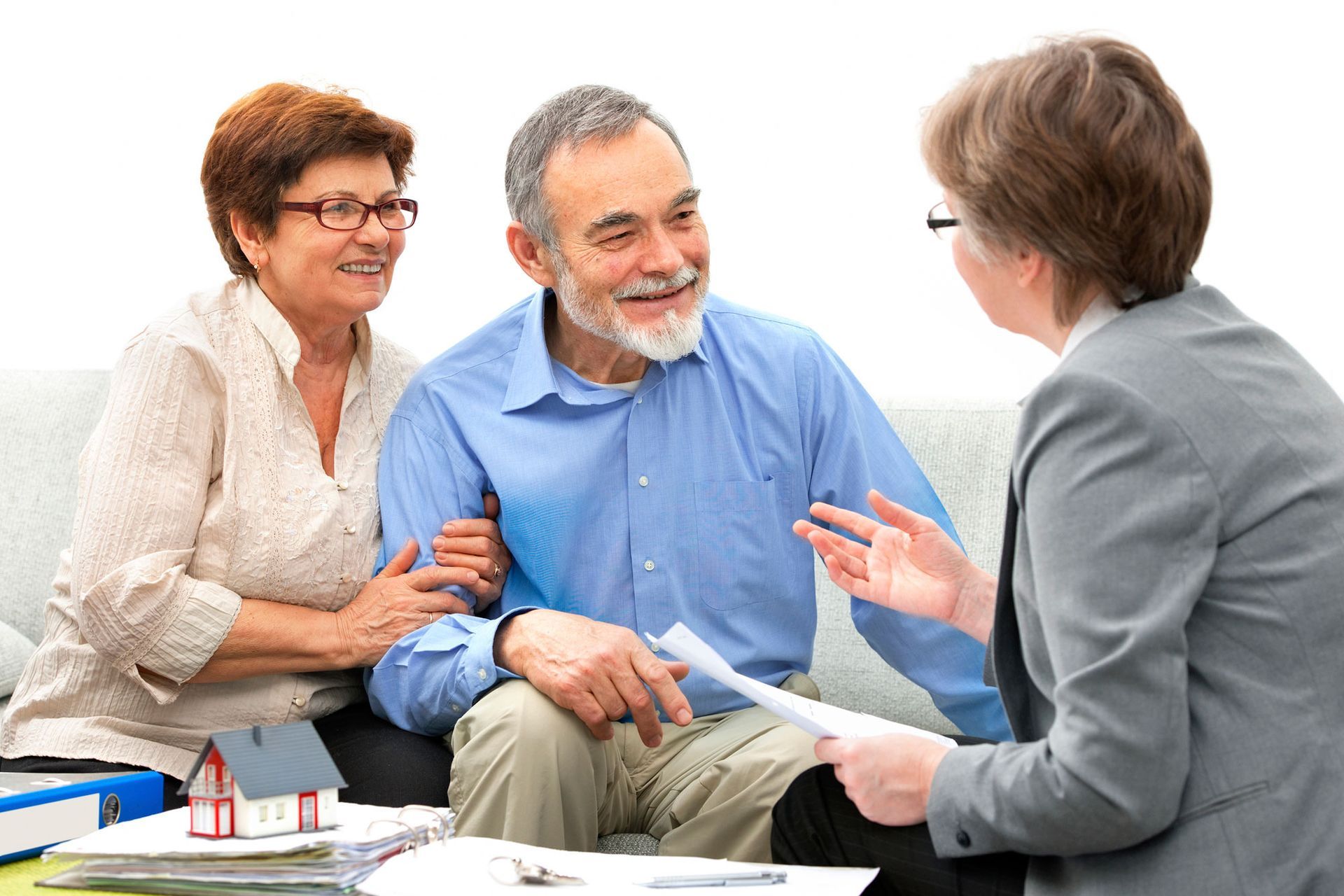 Happy people sitting across from a Estate Planning Services consultation by Escobar & Associates Law