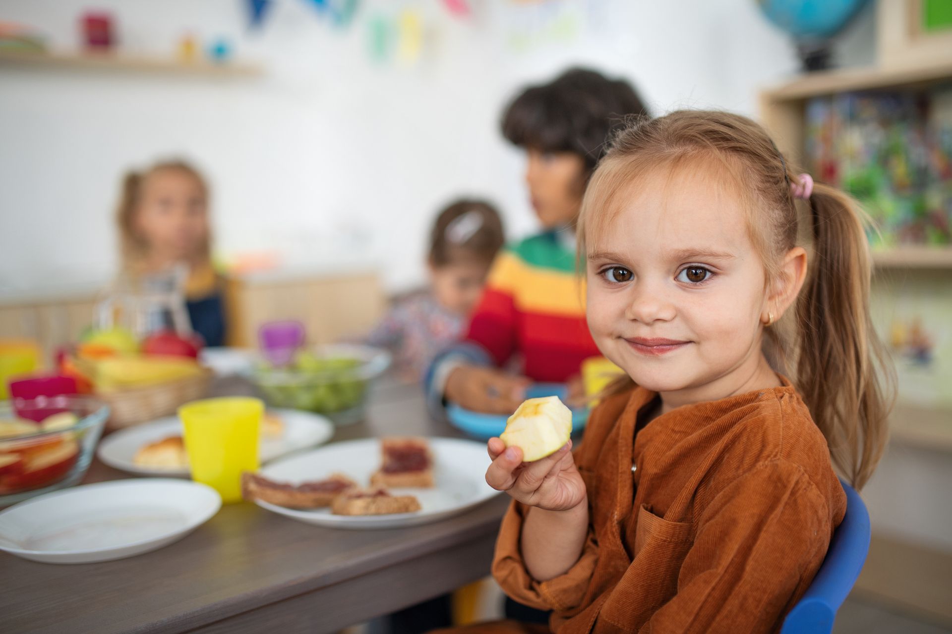 Photo Of Kid Eating — West Allis, WI — First Class Child Care