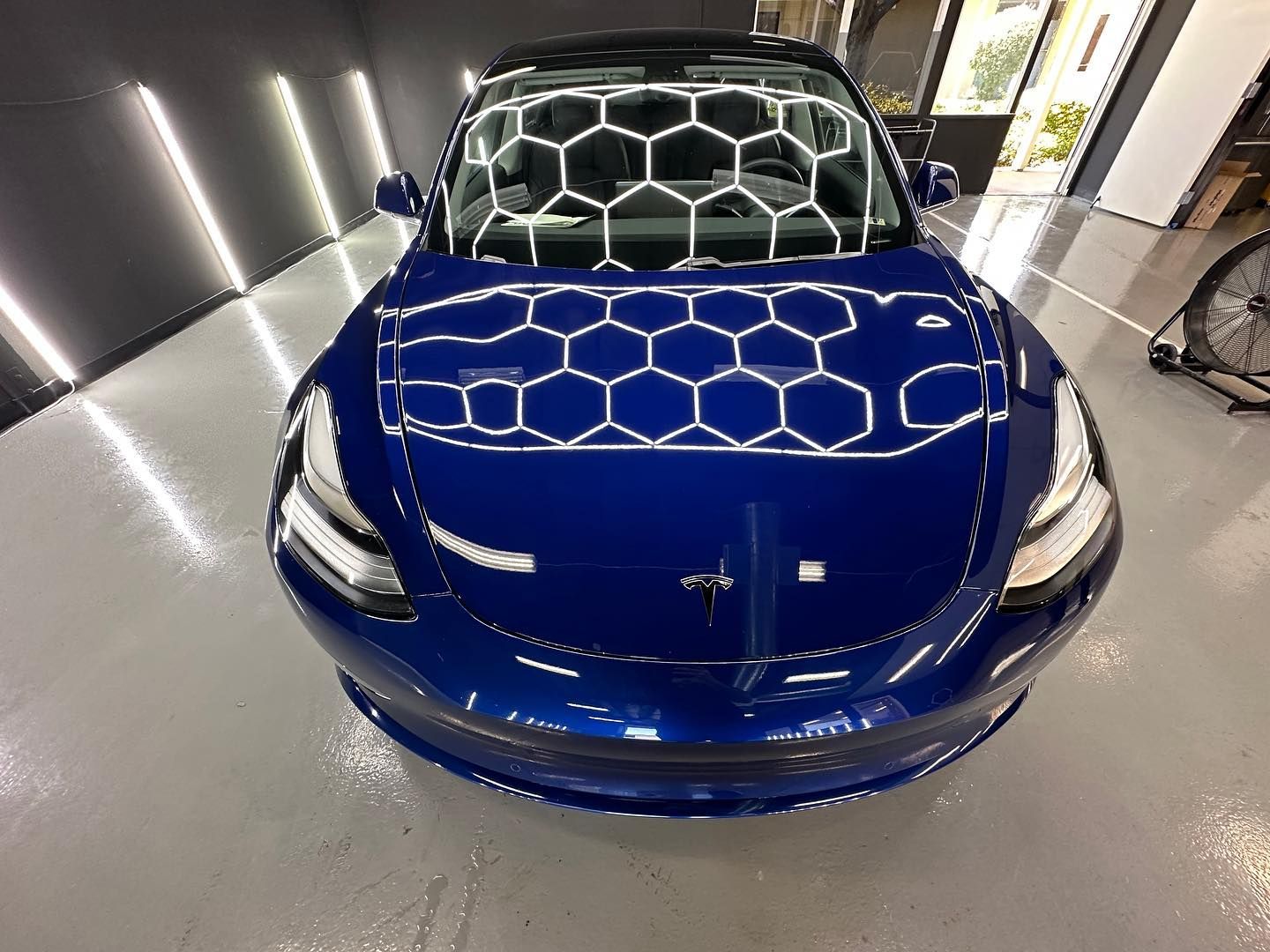 Clean, polished car surface after ceramic coating