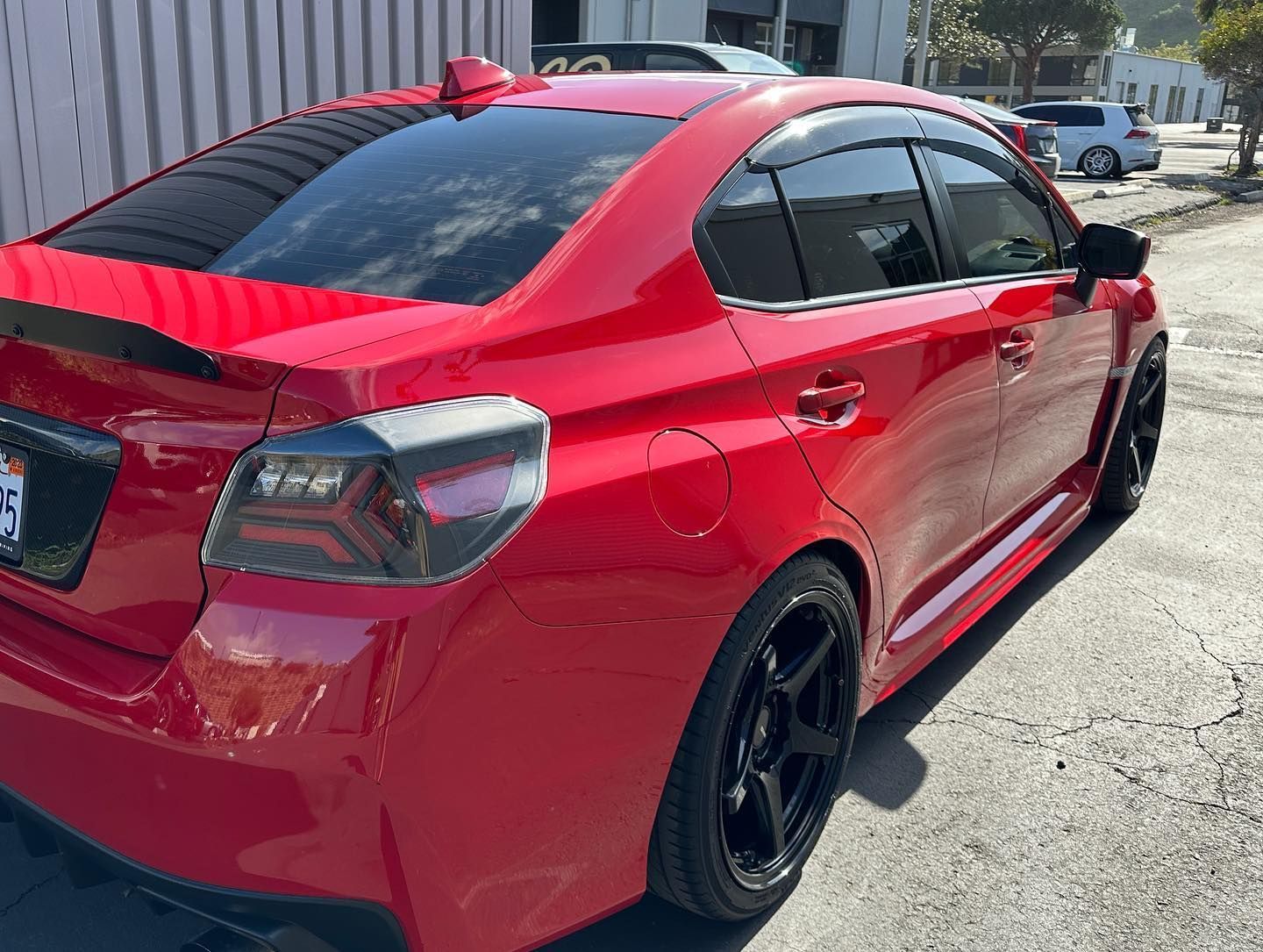 Car with professionally installed dark window tint for enhanced privacy and UV protection