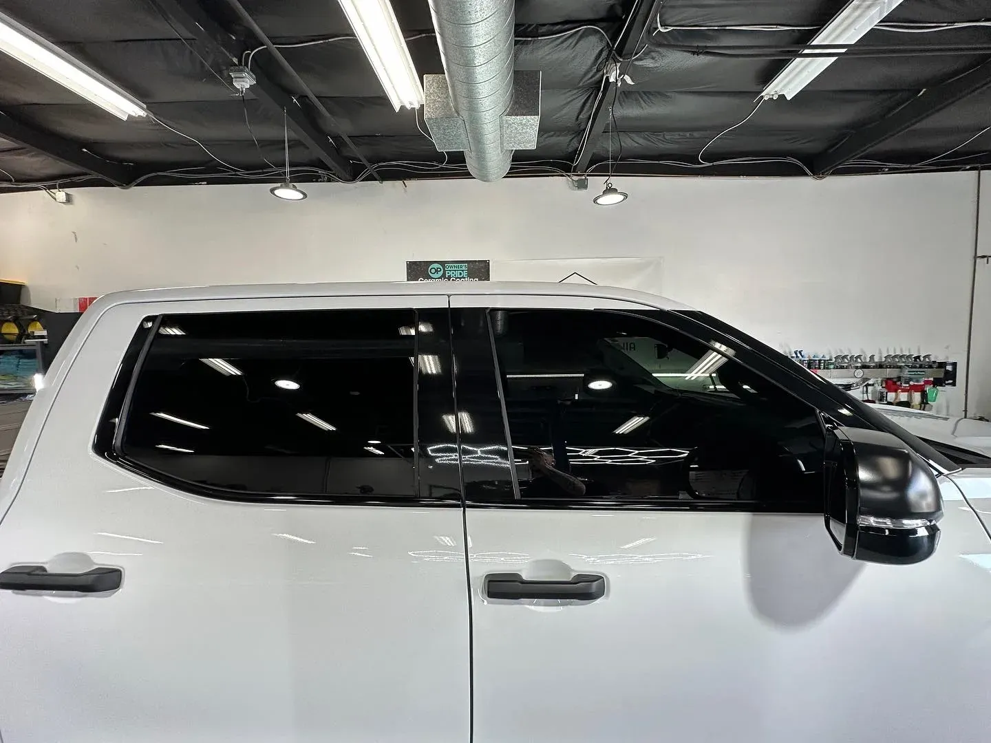 Auto window tint on a white vehicle