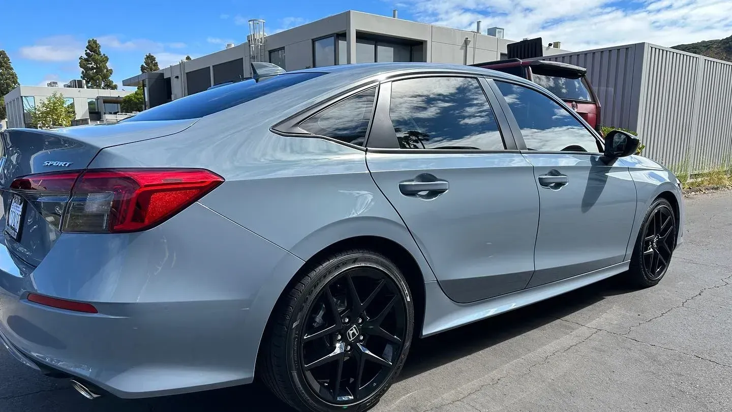 Blue car with window tint installed by Official California Detailing