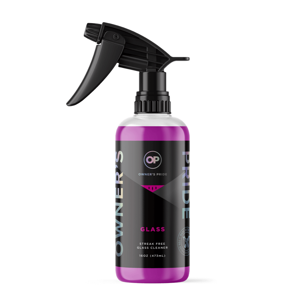 A bottle of glass cleaner with a black sprayer on a white background.
