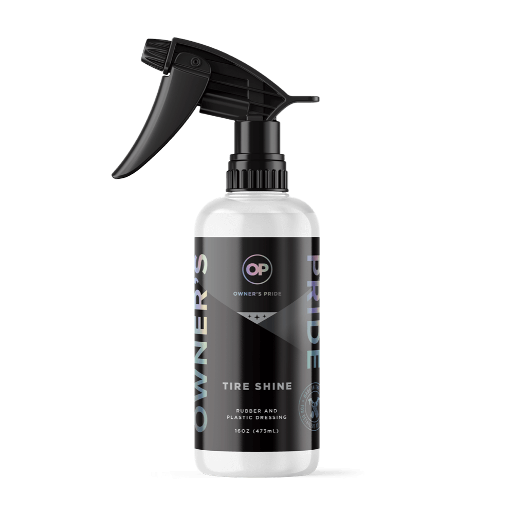 A bottle of tire shine with a black sprayer on a white background