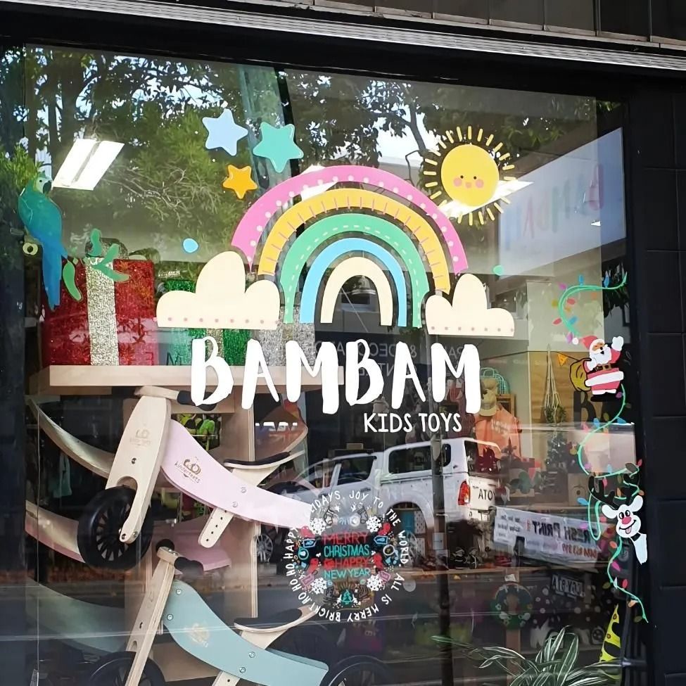A Store Front With a Rainbow and a Stroller in It — Fresh Print Signs in Murwillumbah, NSW