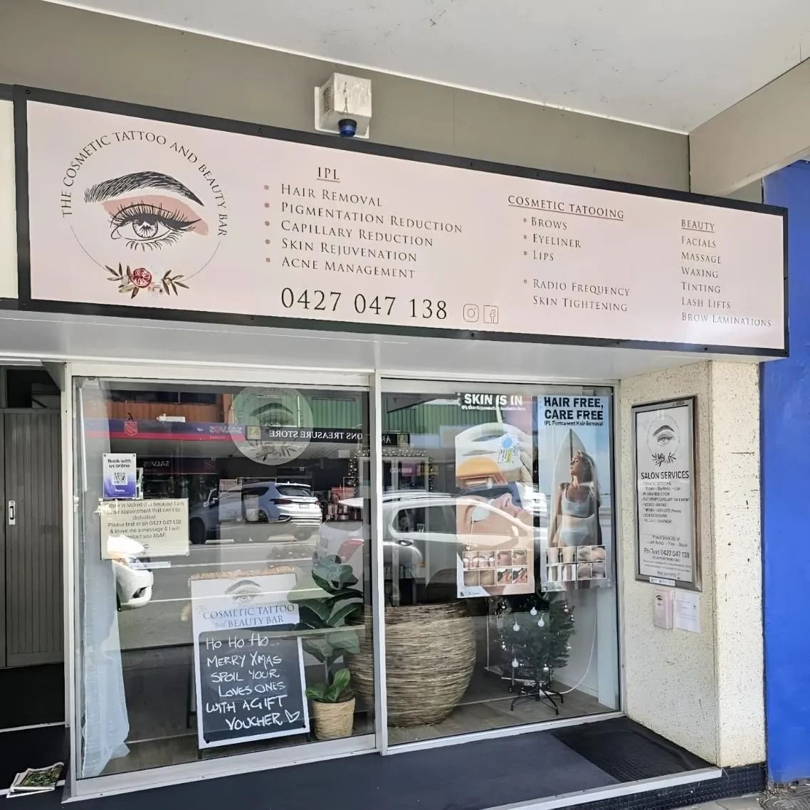 The Front of a Beauty Salon With a Large Sign Above the Door — Fresh Print Signs in Murwillumbah, NSW