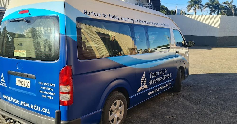 A Blue and White Van is Parked in a Parking Lot — Fresh Print Signs in Murwillumbah, NSW