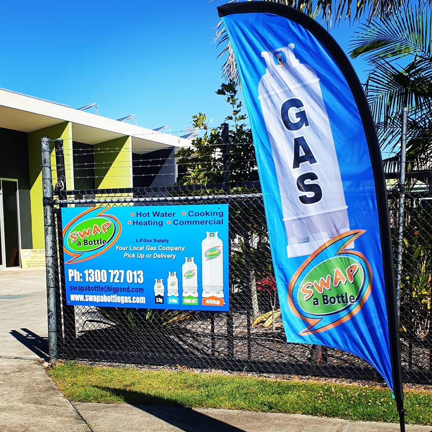 A Blue and White Truck is Parked in Front of a Building — Fresh Print Signs in Murwillumbah, NSW