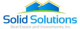 The logo for solid solutions real estate and investments inc.