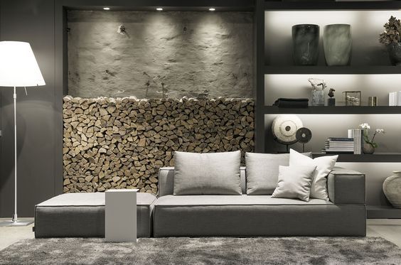 Een woonkamer met een bank van Sur&Plus