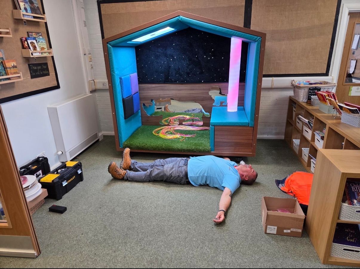 Kevin Wheatley relaxes after sensory nook install at Willow Primary School Doncaster Yorkshire Kevin Wheatley relaxes after sensory nook install at Willow Primary School Doncaster Yorkshire