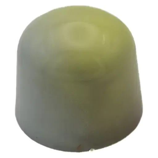 A close up of a blue and gold chocolate candy on a white background.