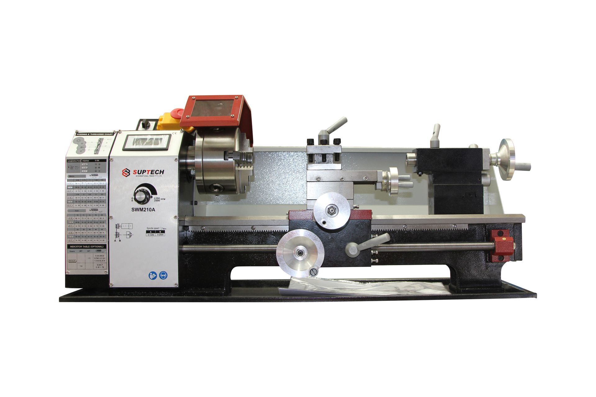 A lathe is sitting on a table in a room.