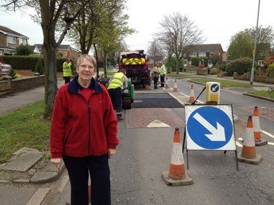 Repairing potholes in Tyne Crescent
