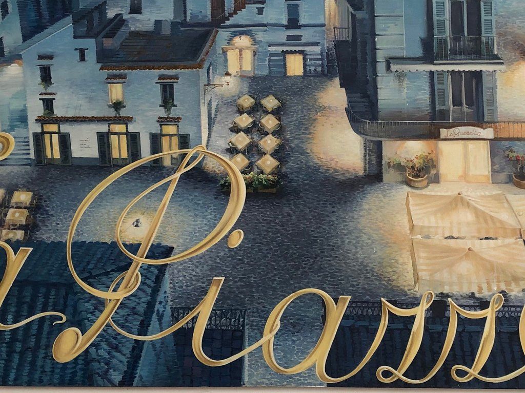 Ristorante con tavoli all'aperto nel centro di Amalfi