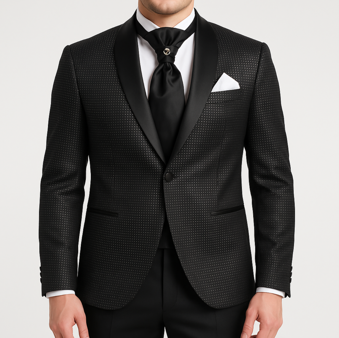 A man is wearing a black tuxedo and tie