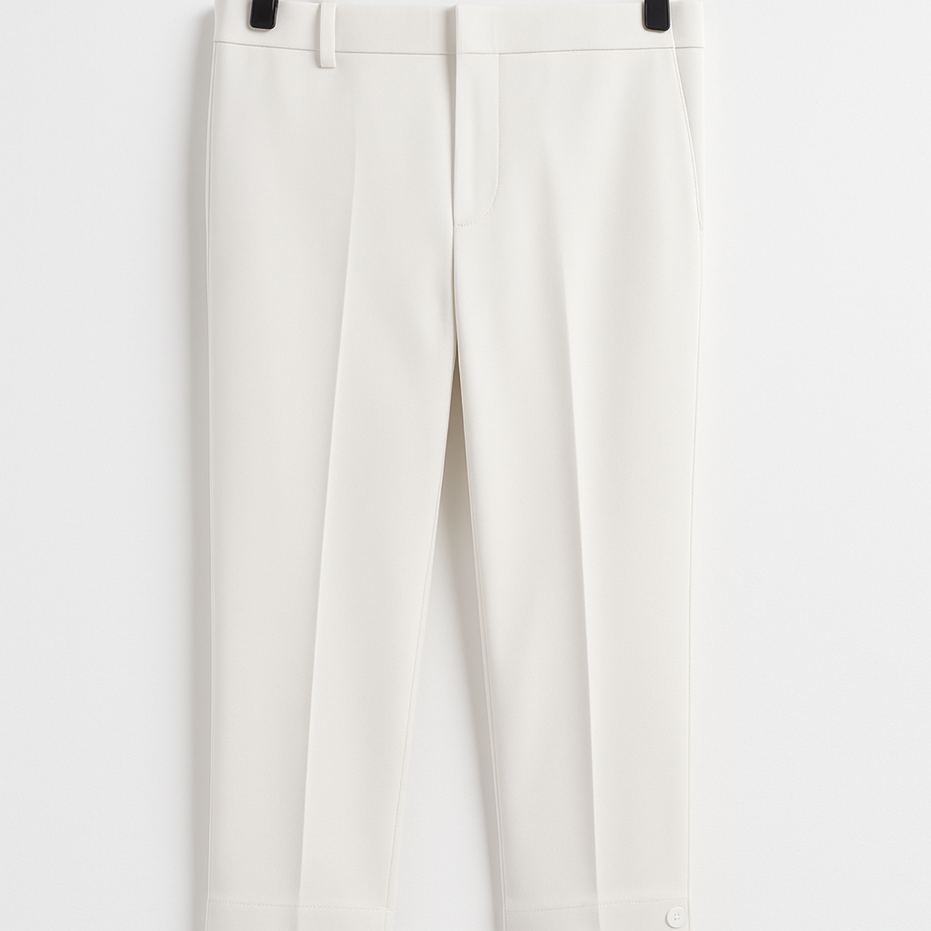 A white tuxedo jacket is shown on a white background