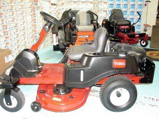 Senior man sitting on riding lawn mower - Lawn & Garden Equipment and Supplies in Twin Falls ID