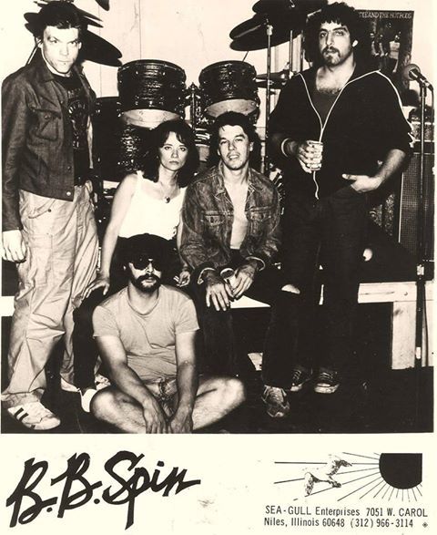 A black and white photo of a band called b.b. spin