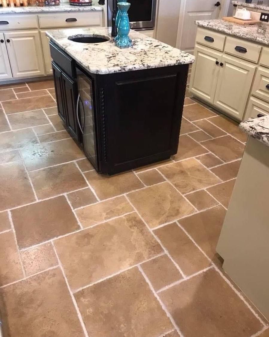 This kitchen tile and grout underwent professional cleaning and color sealing to restore its appearance. Say goodbye to scrubbing on your knees and contact expert tile cleaners for professional tile and grout cleaning results.