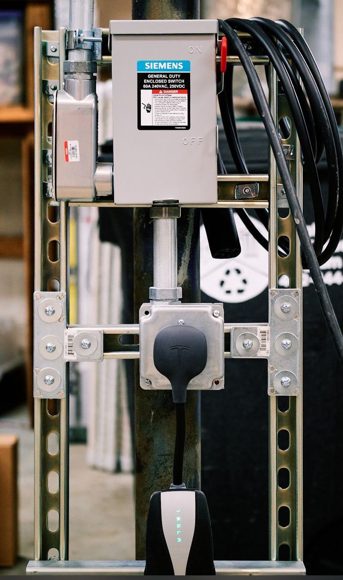 A close up of a electrical box with a plug attached to it.