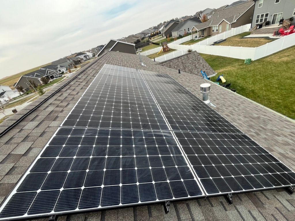 A roof with a lot of solar panels on it