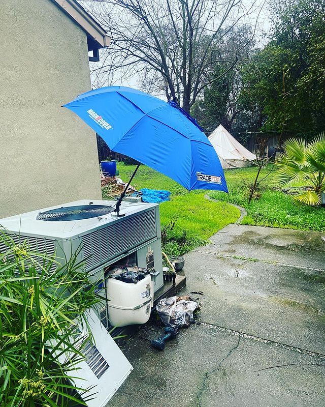 A blue umbrella with the word cool on it