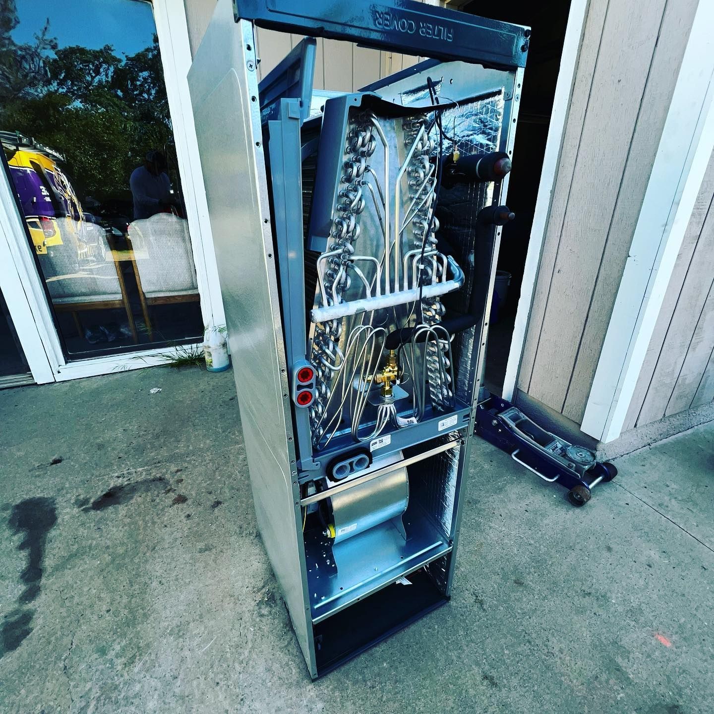 The inside of a refrigerator is shown with the door open.