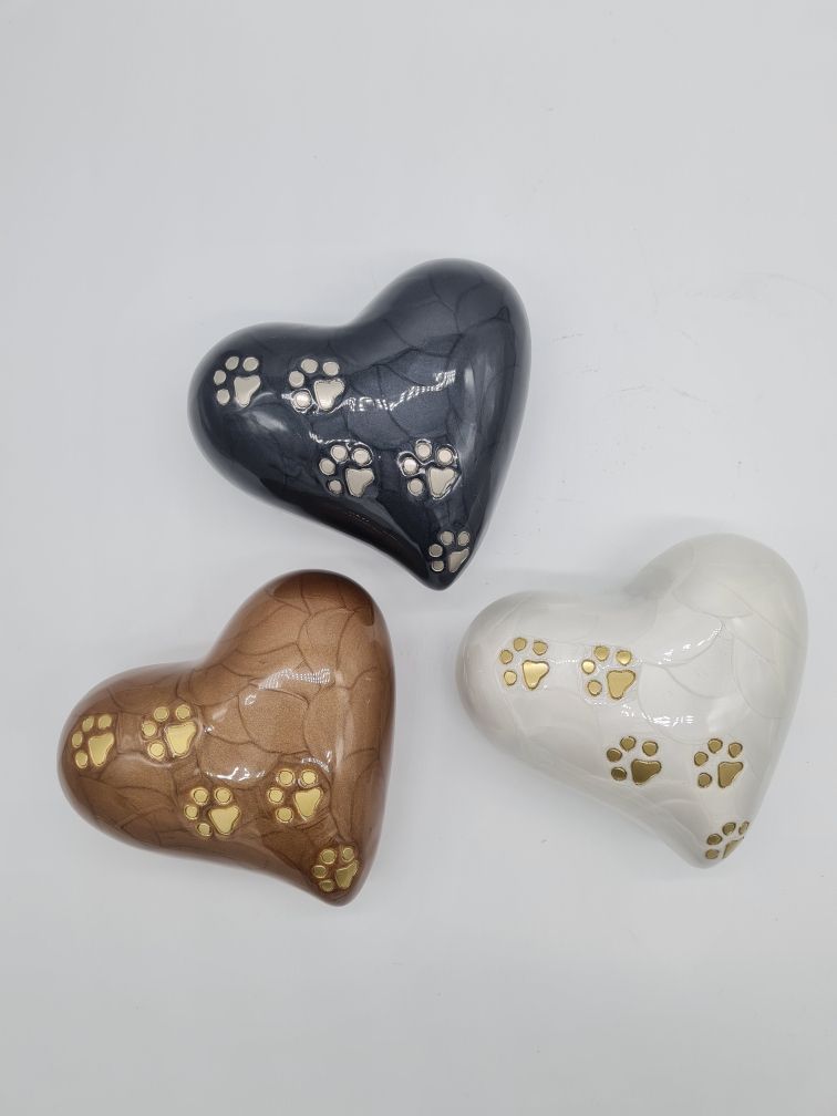 Three Heart-shaped Pet Urns: Gray, Brown, and White — Furever Pet Cremations in Rockhampton, QLD