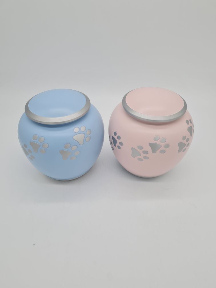 Cremation Urn for a Pet, Cream Coloured With Paw Print Design and Silver Accents — Furever Pet Cremations in Rockhampton, QLD