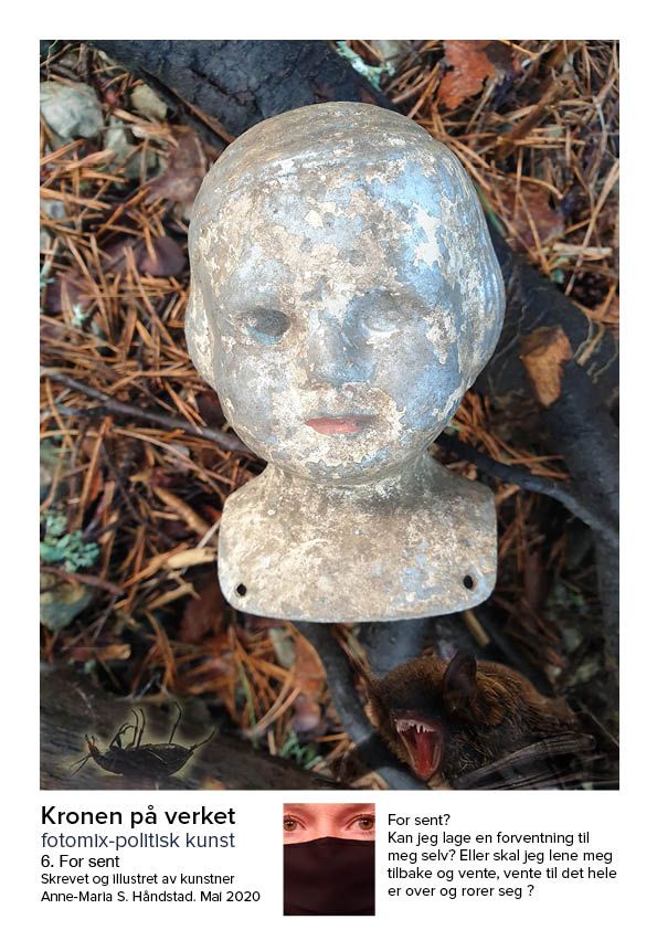 En statue av et barnehode ligger på bakken.