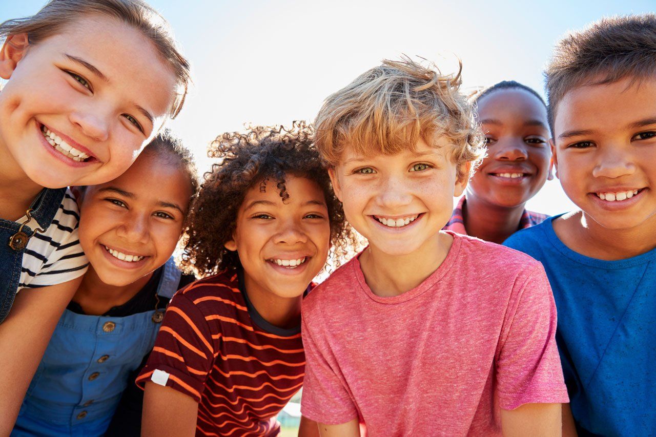 Group of kids smiling — Montgomery, AL — David S Leslie DMD Family Dentistry