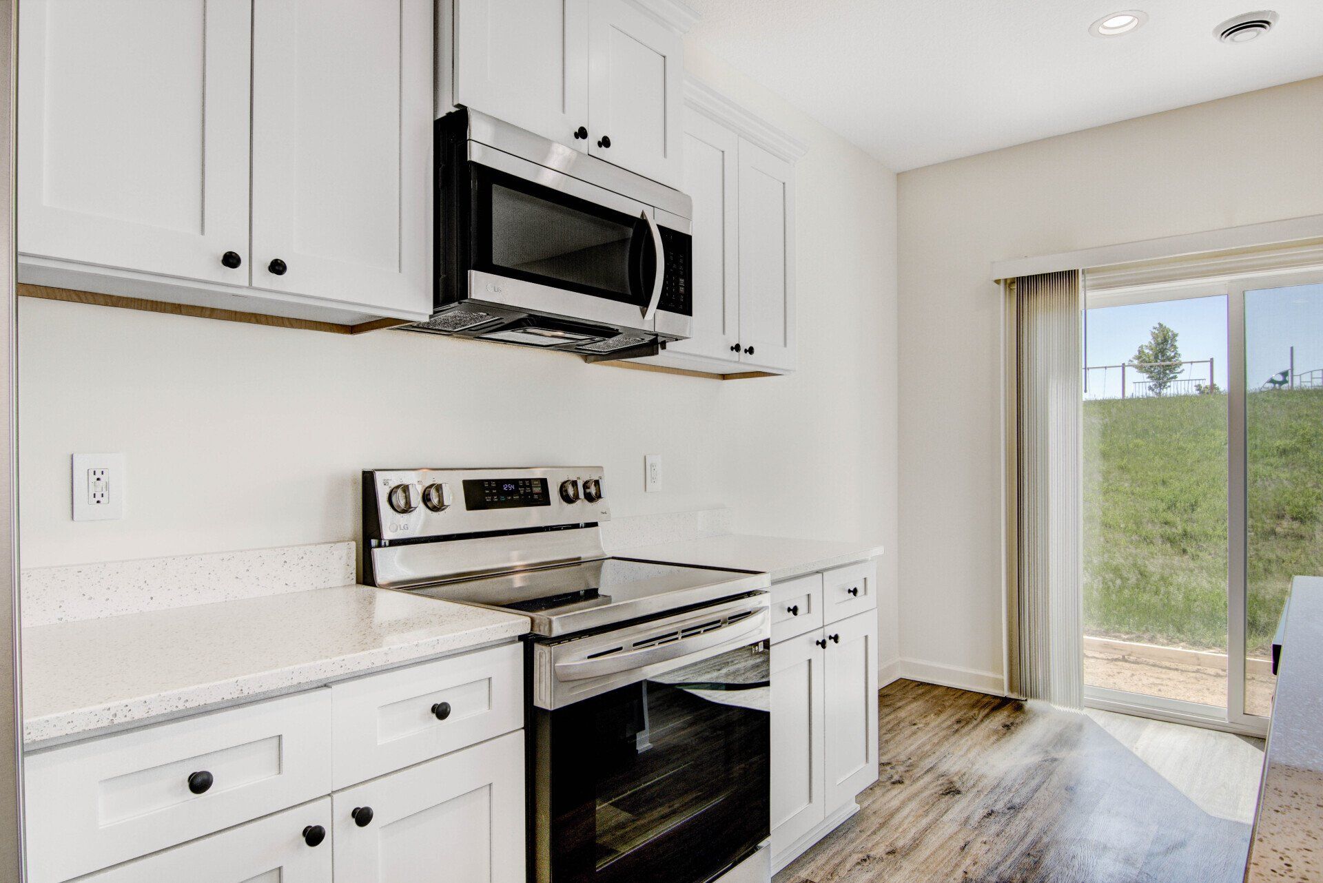 River Falls Stove And White Countertop Photo