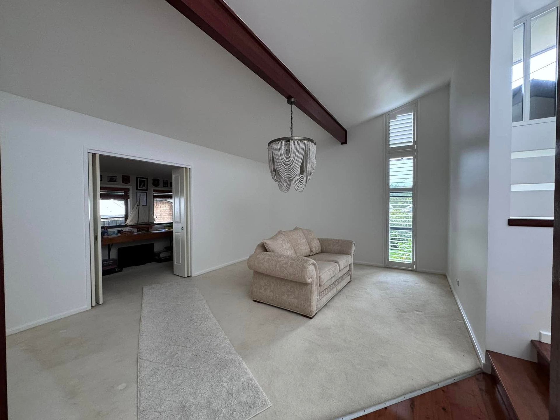 A Corner of a Room With White Cabinets and a Rug — JAX Painting Services in Central Coast, NSW