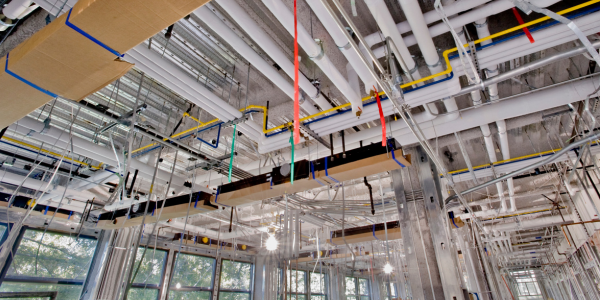 Plumbing in a commercial building before walls are put up