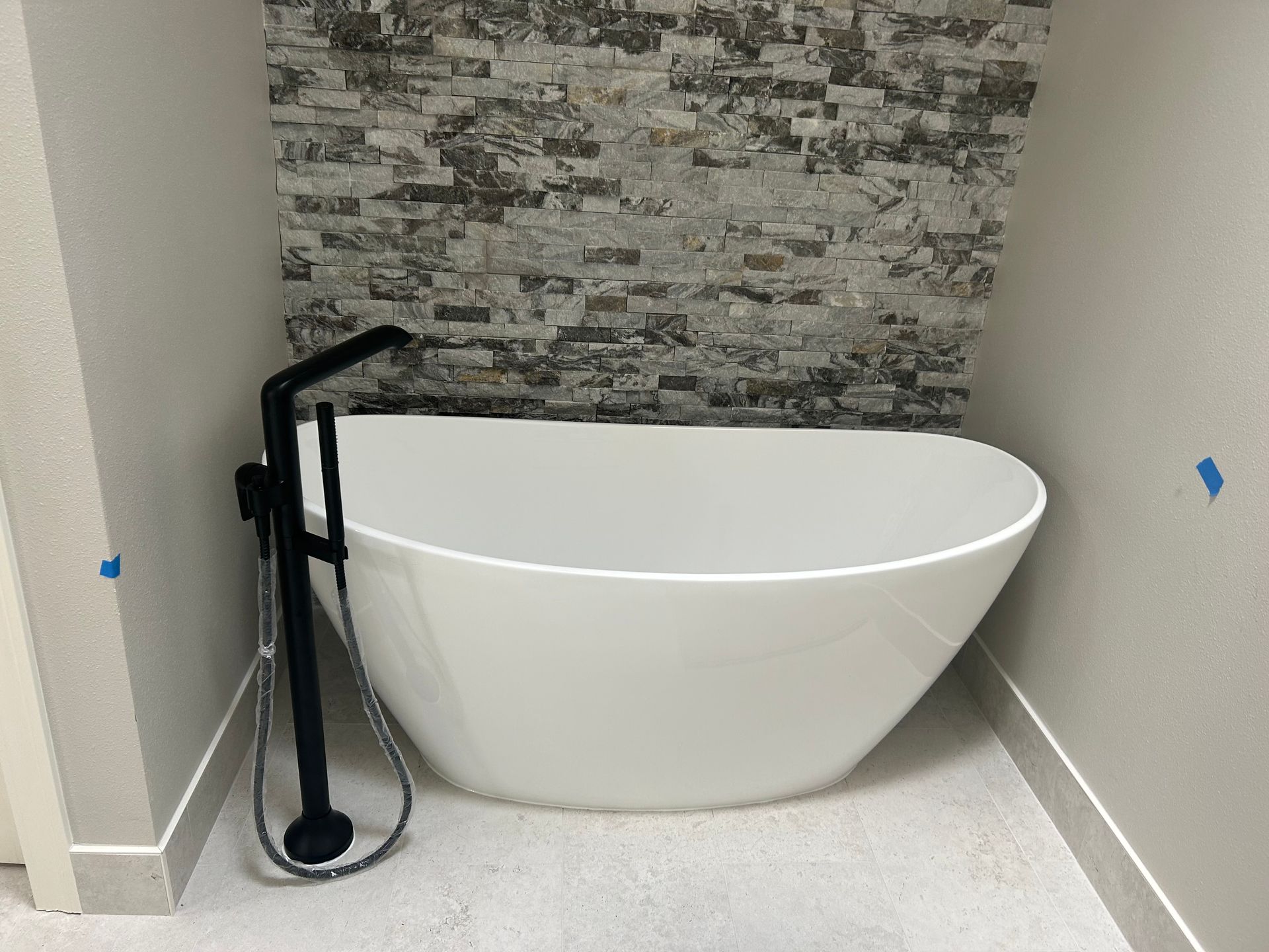 A freestanding bathtub installed by Royal Flush Plumbing in Tacoma