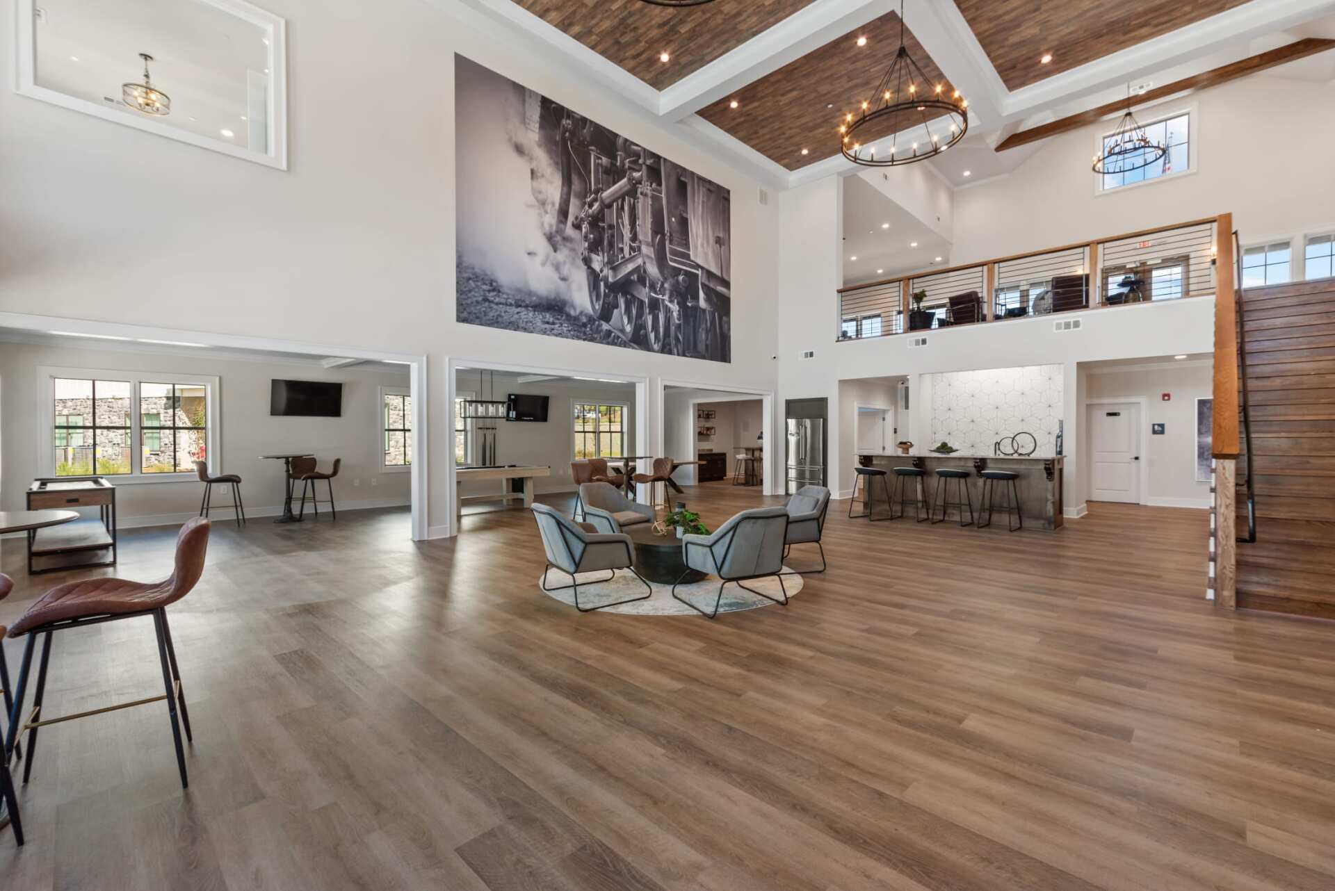 The Blakely apartment high ceiling clubhouse with seating areas.