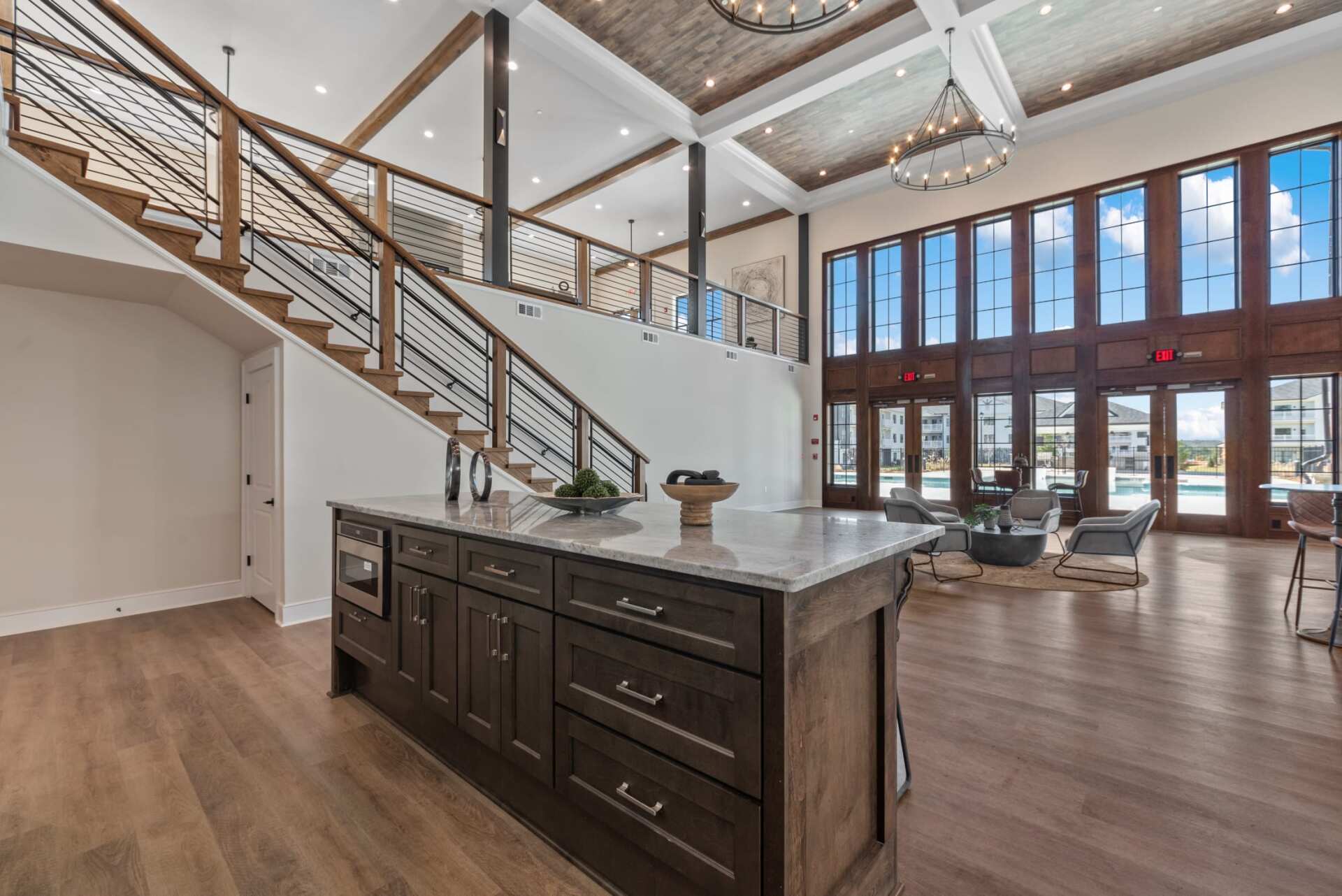 The Blakely apartment high ceiling clubhouse with community kitchen.