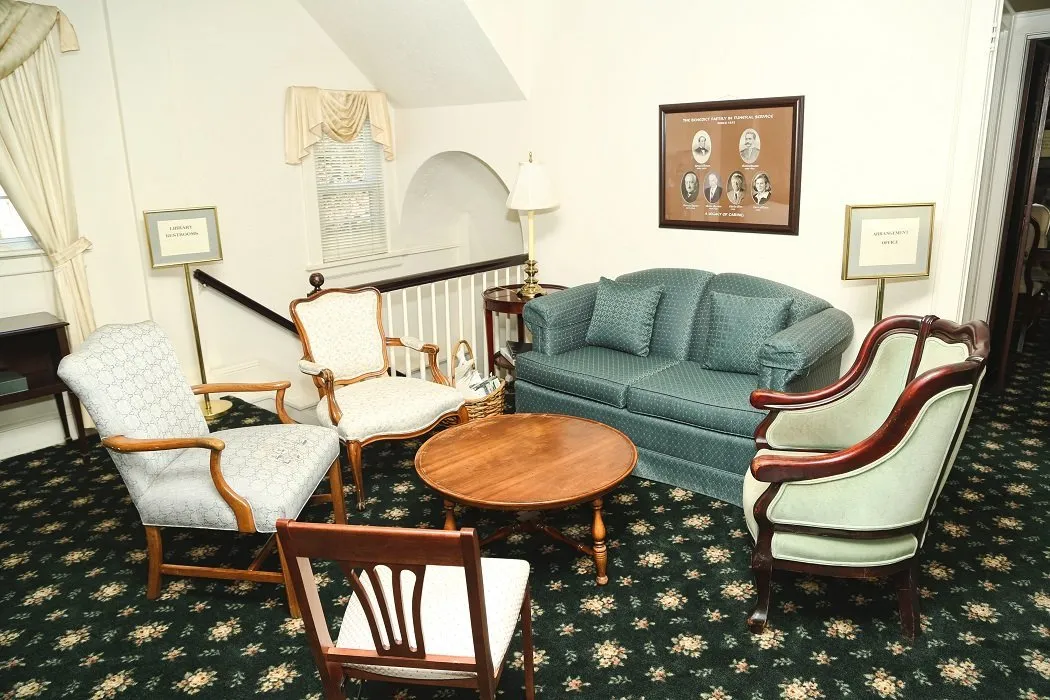 local funeral home lounge area with large sofa